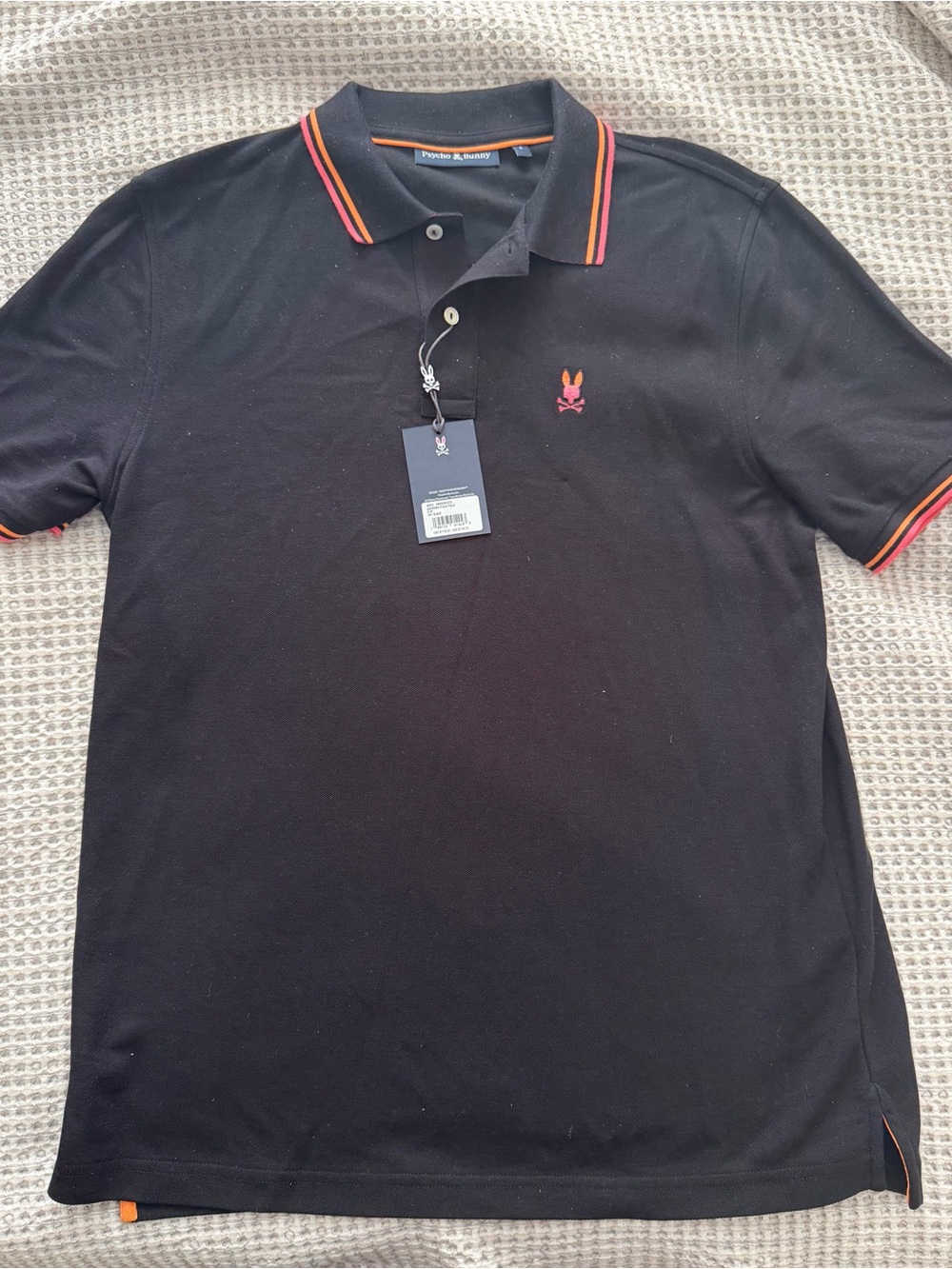 Psycho Bunny Black Polo with Orange Trim and Logo